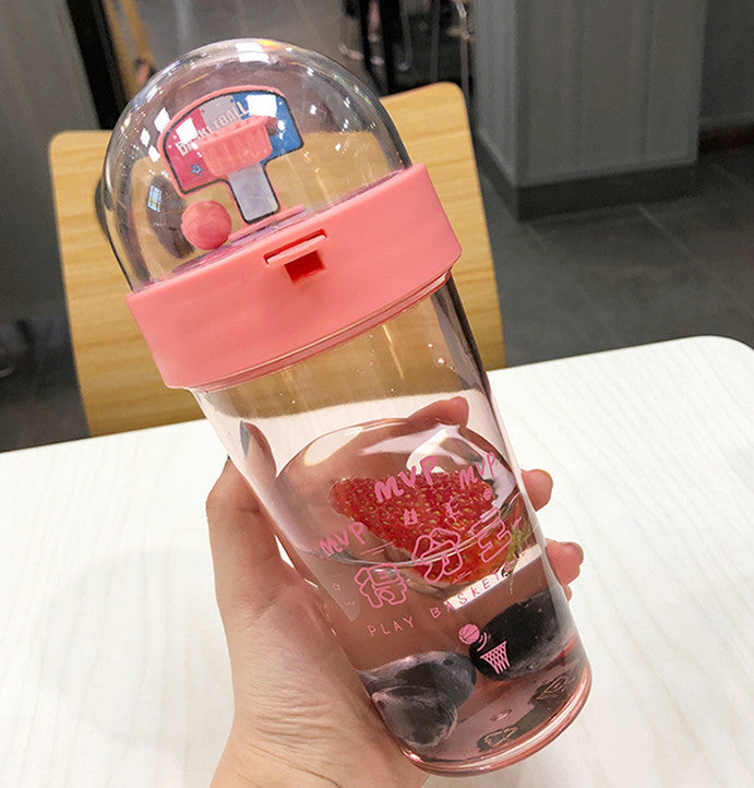 Beckett™ basketball-shaped water bottle with a sporty design and screw-top lid, ideal for basketball fans and active lifestyles.