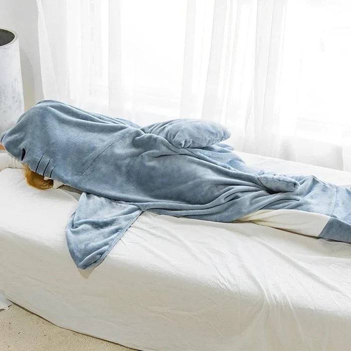 Beckett Shark onesie featuring a hood with shark fin, soft fabric, and playful design for cozy, fun wear.