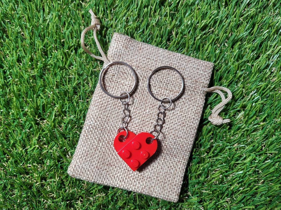 Colorful Lego Love charms by Beckett, featuring small interlocking brick designs perfect for jewelry or crafts.